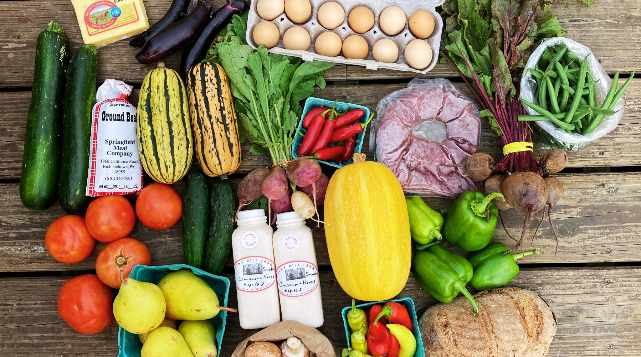 Farm Share Mixture of produce and other products on a table