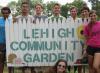 Community Garden sign with students